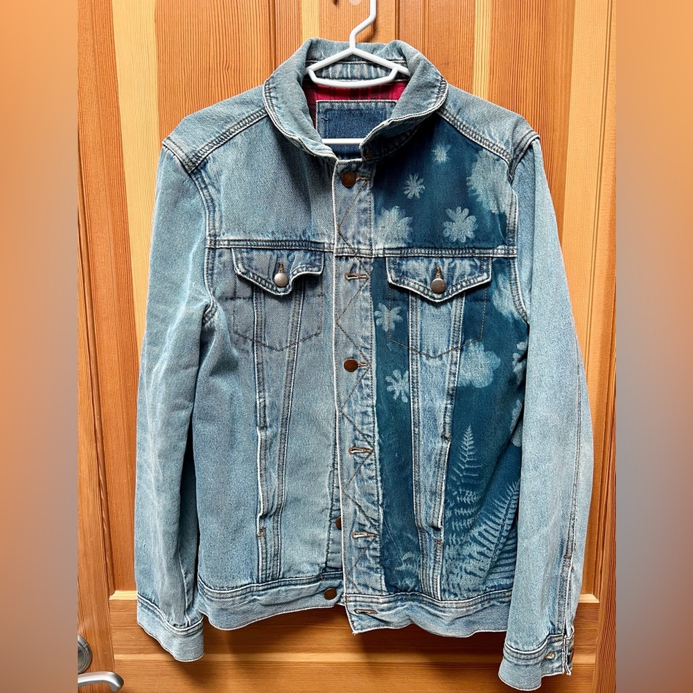 Hand dyed denim jacket with flannel interior.